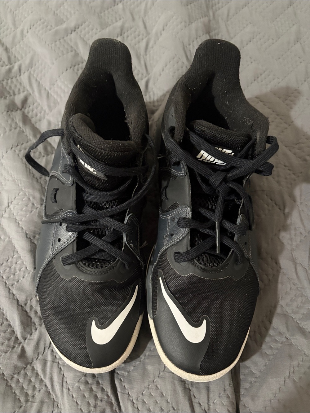 Nike Men’s Black Sneakers with White Swoosh